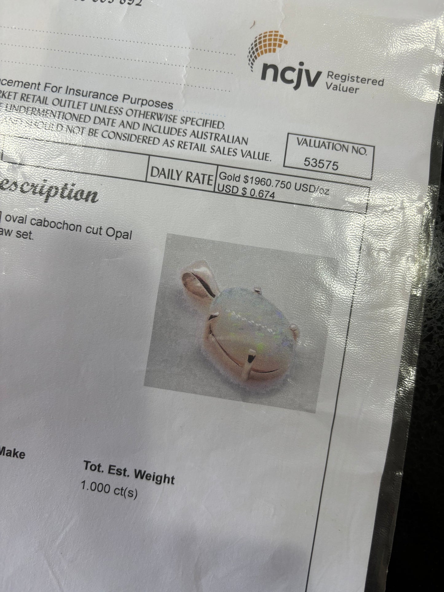 1 Carat Firey Solid White Opal & 9ct Gold Pendant with Valuation