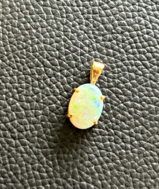 1 Carat Firey Solid White Opal & 9ct Gold Pendant with  Valuation